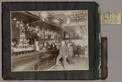 The interior of Reilly's Saloon, located in Reilly's Hotel, 408-410 West Franklin Street, Baltimore, Maryland. The hotel was four stories tall with 39 guest rooms and was established and owned by Hugh Reilly (1860-1917) until his death.