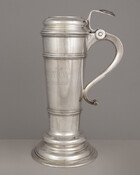 This trophy cup in the shape of a lidded flagon was awarded to the winner of the Twentieth Annual Maryland Hunt Cup Steeplechase, established in the year 1894. The lid is embellished with a cast version of the Maryland State Seal on the thumb grip. This particular trophy was won by the horse Zarda, who…