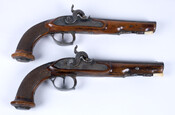 Pair of dueling pistols with ivory ramrods and inlaid lions. Owned by the Charles William Ferdinand (1735-1806), the Duke of Brunswick, who was killed at Waterloo. Pistols have been altered from flintlock to percussion.