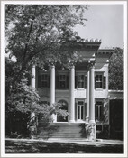 Exterior view of the Evergreen House front porch. The Evergreen estate was built by Baltimore, Maryland's Broadbent family in 1857, then was sold in 1878 to John Work Garrett, president of the Baltimore and Ohio Railroad. Garrett purchased the estate for his son, and it served as home to two generations of Garretts. In 1942,…