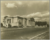 A street view of the Baltimore Museum of Art (BMA) building located at 10 Art Museum Drive in Baltimore, Maryland. Modeled after the Metropolitan Art Museum in New York, New York, the museum was designed by architect John Russell Pope (1874-1937) who was known for his serene and monolithic neo-classical designs. The 210,000-square-foot three-floored building…