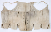 Bodice stays worn by an adult woman in the late Colonial period. Garment fastens in the front with 7 holes for lacing on each side. The corset contains ten whale bones for support.