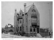 View of the front and side of Lee House, an ornate home located at Charles and Preston Streets in Baltimore, Maryland.