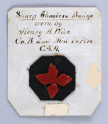 Sharpshooters badge consists of a red four-pronged emblem atop an octagonal dark blue patch. This uniform emblem was worn by Private Henry Adam Wise (1842-1899), Company B, 2nd Battalion, 2nd Maryland Infantry (CSA). Born at "Green Holly" in St. Mary's County, Wise helped organize the 2nd Maryland, enlisting on September 1, 1862, with his brother…