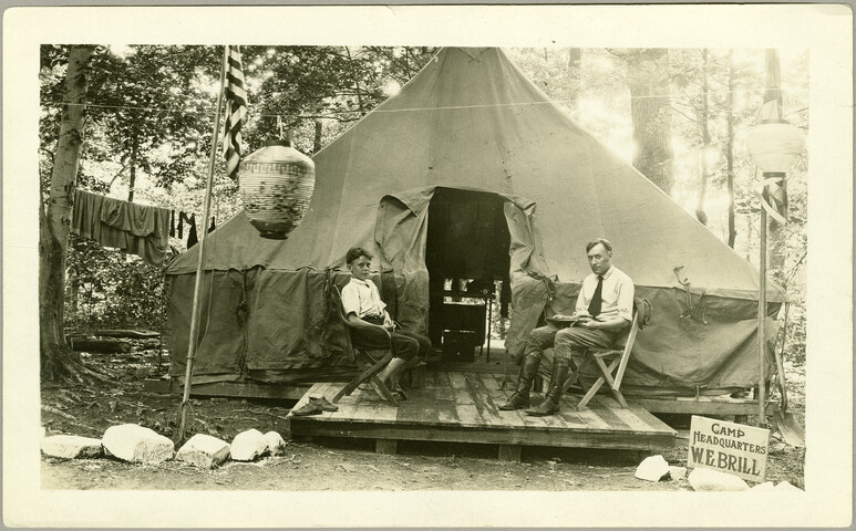 W. E. Brill and boy at Camp Hutzler headquarters — 1921