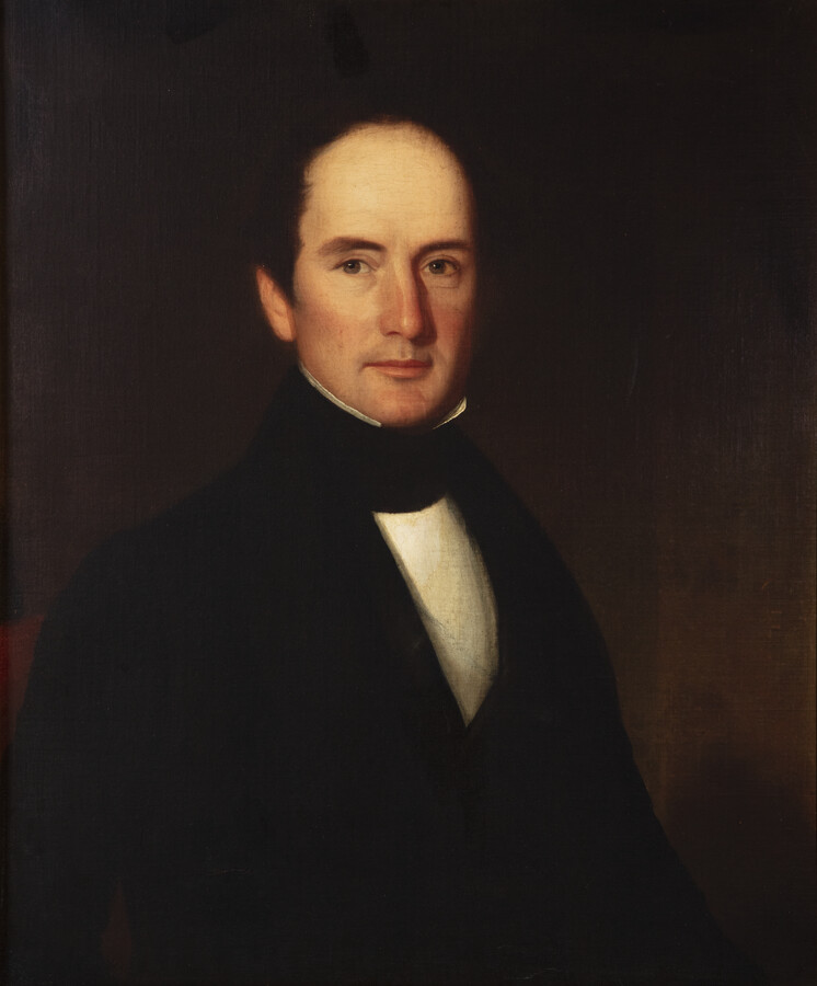 Portrait of Henry Power Daingerfield (1800-1866). He is portrayed as a white man with short, dark brown hair and brown eyes. He wears a black suit with black stock and white shirt.
