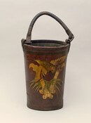 Fire bucket from the Baltimore Equitable Insurance Company, likely used by the Vigilant Fire Company of Baltimore, Maryland. Embellished with a painted red parrot surmounting a gilded letter on a red ground with green and orange pinstriping.