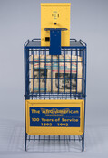 Newspaper box containing a centennial edition of The Afro-American Newspapers commemorating 100 years of service from 1892 to 1992. This newsstand was located at 2519 North Charles Street, Baltimore, Maryland, 21218.