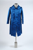 Blue satin double-breasted coat with turned-down collar. Worn by Wallis Simpson, the Duchess of Windsor (1896-1986).