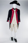 This uniform was made for the American Bicentennial in 1976. The wearer portrayed a lieutenant in the Maryland Line. The full uniform consists of a cocked hat, a regimental coat with a reproduction Society of the Cincinnati medal and lieutenant's epaulet, a woolen waistcoat, woolen breeches, a pair of linen overalls, and a pair of…