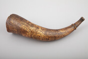 Powder horn likely used during the French and Indian War (1754-1763). The horn is engraved with the name of Jonas Green (1712-1767), a printer born in Boston, Massachusetts. He settled in Annapolis, Maryland, in 1738 where he became the official printer for the state and published the Maryland Gazette beginning in 1745. He also served…