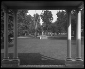 View of the grounds and front gate of Brooklandwood (or Brookland Wood), an historic home in the Brooklandville community of Baltimore County, Maryland. Built in the mid-1790s on land purchased by Charles Carroll of Carrollton, Brooklandwood became the country home of Richard and Mary Carroll Caton. The estate was later owned by prominent banker George…