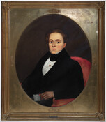 Oval-shaped half-length portrait of Alexander Gould, Sr (c. 1779 – 1859). He has brown hair and eyes and looks directly out of the picture plane. He wears a black coat and stock with a white shirt as he is seated in a red armchair, holding a letter in his left hand.