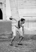 Baltimore native Robert Garrett (1875-1961), photographed here with discus, joined twelve others to make up the entire first Olympic team representing the United States in the revived Olympic Games in Athens, Greece, in 1896. Garrett was the son of Baltimore businessman T. Harrison Garrett and nephew of Robert Garrett, an early B&O Railroad Company president.…
