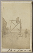Image depicts an unidentified African American soldier sitting with his legs straddling a rough rail suspended in the air at the Union military base in Point Lookout, Maryland. This was a device for punishing soldiers during the Civil War and was called "the mule," "the wooden horse," or "riding the rail." The print includes a…