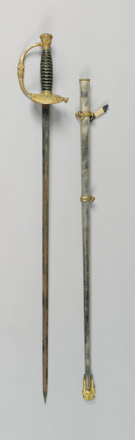 G.A.R (Grand Army of the Republic) rapier owned by Captain Edwin W. Moffett of the 8th Maryland Volunteer Infantry, U.S.A. The G.A.R was a Union Veteran's Association. Members wore G.A.R swords with their uniforms. The swords are based on the 1860 Staff and Field Officers Sword. Captain Moffett was a member until his death in…