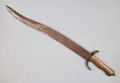 Sword, curved blade, found by George Bayer merchant tailor of Baltimore who visited friends near battlefield found sword 3 days after the Battle of Gettysburg. This is likely a Yataghan Sword Bayonet that attaches to a pattern 1853 Enfield rifle. These types of sword bayonets were produced in England and Germany. It was likely carried…