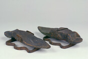 Pair of women's pattens. These protective overshoes were worn outdoors to elevate a wearer's feet above mud and dirt, such as animal excrement, and preserve one's shoes.