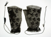Pair of black silk mesh mitts with black floral embroidery and drawstring cuffs trimmed with tassels. Belonged to Mrs. James Hampton Long (nee Sarah Elizabeth Sprigg) (1829-1911) from Cumberland, Maryland.