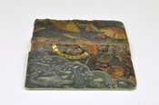 Leather card case embossed and painted with bird and floral pattern, embellished with silver fitting featuring an embossed alligator design. Given to Mrs. Nathan Naiman (nee Celia Josephson) in 1890.