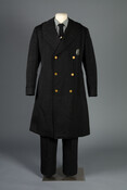 Uniform of John Lester Heavner (1910-1974), police officer of the Baltimore & Ohio Railroad Company. The wool overcoat (.2), jacket (a), shirt (b), pants (c), and tie (e) date to the 1970s. Born and raised in Elkins, West Virginia, Heavner worked as a road laborer for the Works Progress Administration and bartender before World War…