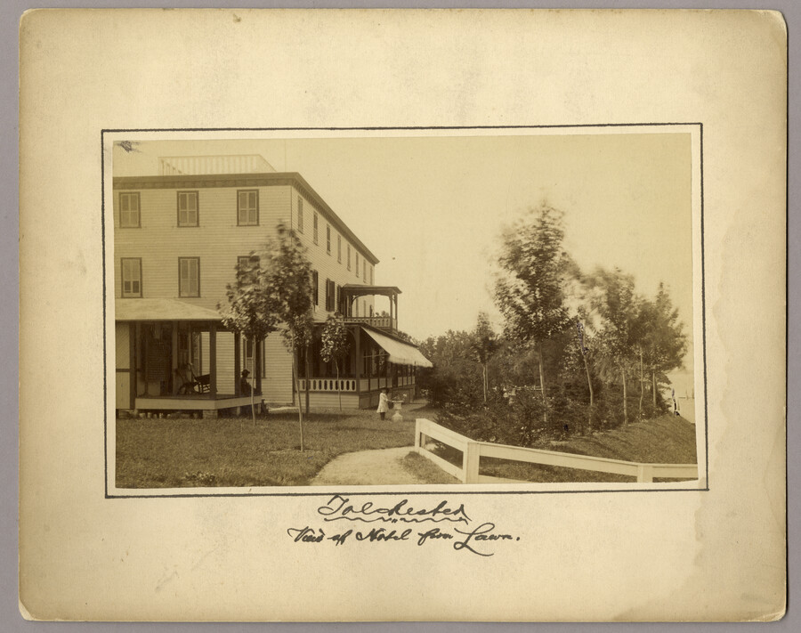 Side view of the hotel and its lunch room in Tolchester, Maryland. An adult sits on the porch and watches a child in front of the building. The hotel was part of the Tolchester Beach Amusement Park located in Kent County, Maryland. The park also consisted of a bathing beach, amusement park, and racetrack, and…