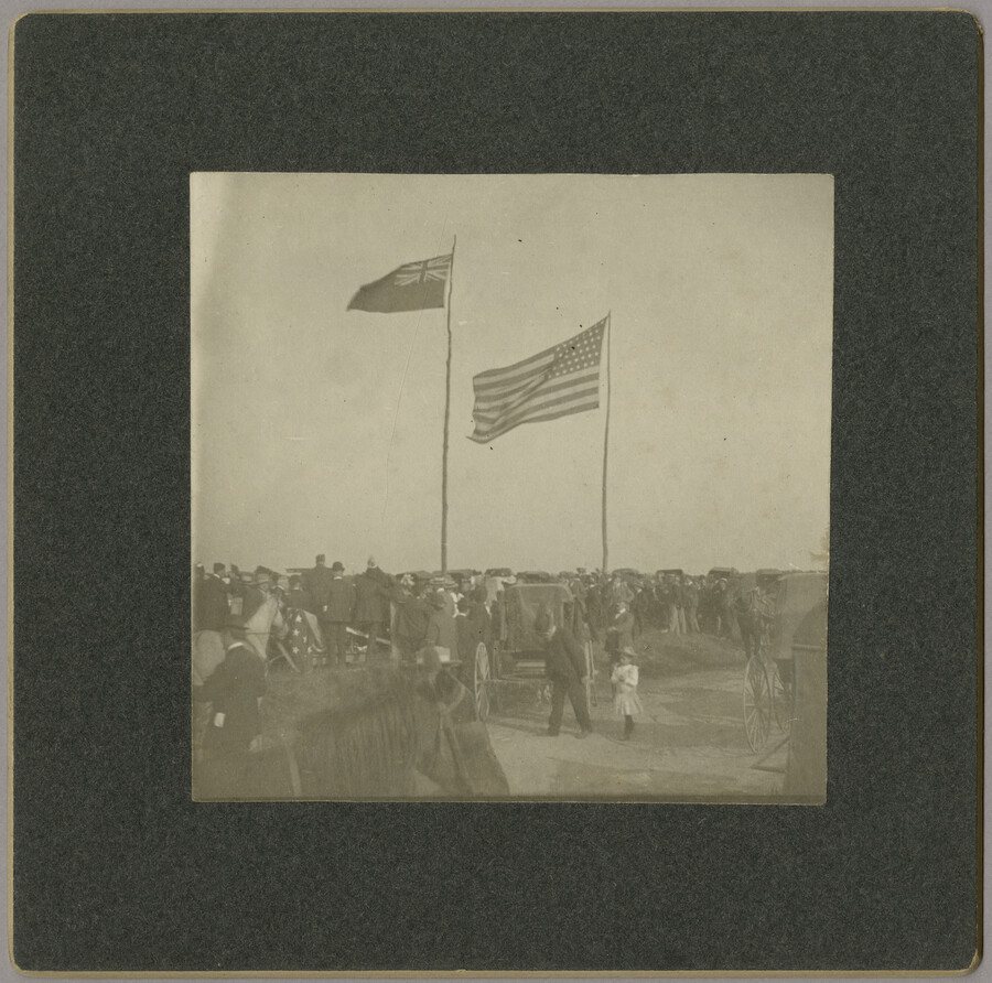 A large crowd gathered for the unveiling of the Caulk's Field Monument in Kent County, Maryland. Two large American flags fly above the crowd. Located on Caulk's Field Road between Fairlee and Tolchester, the monument was installed by local citizens in order to commemorate the Battle of Caulk's Field. This battle was fought during the…
