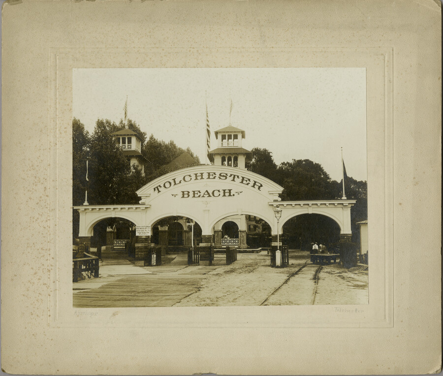 A front view of the entrance archway located on the pier of the Tolchester Beach Amusement Park in Tolchester, Maryland. This Kent County park consisted of a bathing beach, amusement park, racetrack, and hotel, and was in operation from 1877 to 1962. It was a popular vacation destination for Baltimoreans as it was only 27…