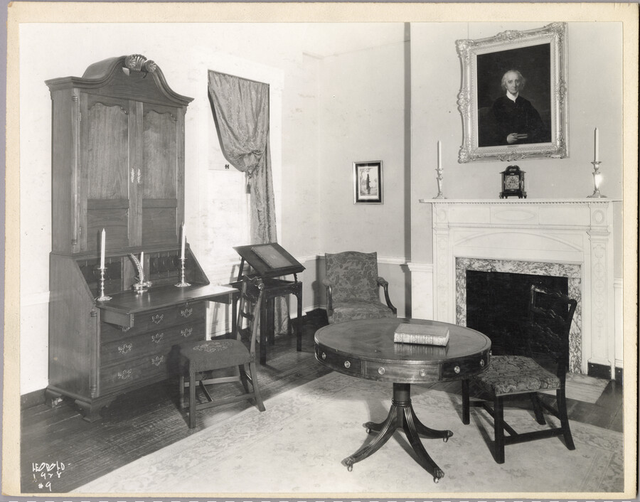 View of a fireplace and seating area in the Homewood estate. Homewood was built between 1801 and 1806 as a country home for Charles Carroll, Jr., son of Charles Carroll of Carrollton who was a signer of the Declaration of Independence. The Federal-period Palladian home was in the Carroll family until purchased by merchant William…