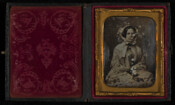 Daguerreotype portrait of Elizabeth Todhunter Thomas (1825-1899) in calling costume, circa 1840-1845. Elizabeth was the daughter of Joseph Todhunter of Baltimore. In 1835, she married Evan Philip Thomas (1806-), who was employed in the Baltimore hardware business. Their children were: Philip William (1842-1861); Isabella Kate Todhunter (1844-1887), married Edwin Goodwin Sythe; and Josephine (1848-1886).