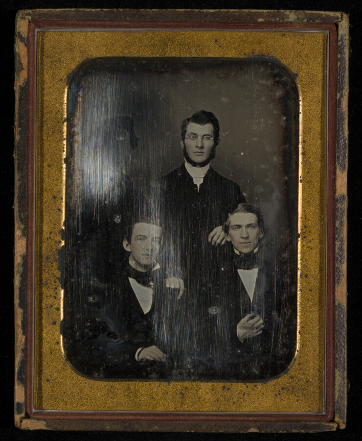 Daguerreotype portrait of Arthur John Rich (1829-1893) and three friends. Rich was a Baltimore clergyman in Reisterstown, and in 1856 he married Fannie K. Miller (1828-1915). Their children were: Arthur Armstrong (1857-1938); Edward Norris (1858-1951), married Louise Baldwin; Mary Rebecca (1860-1861); Alexander Miller (1862-1950), married first Ellen McRoberts and second Elizabeth Farmer; Frank Rogers (1864-1956),…