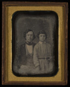 Daguerreotype portrait of James Crawford Nielson (1816-1900) and his son, Albert Nielson (1842-1918). James Nielson was a Baltimore architect and partner in the firm of Niernsee and Nielson with Rudolph Niernsee (1814-1884). In 1840, he married Rosa Williams (1818-1904), daughter of Hon. James Wray Williams of Harford County. The couple were parents to: Albert (1842-1918),…
