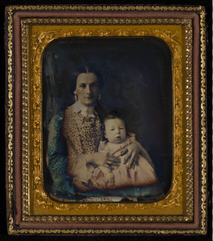 Portrait of a young woman with a baby — circa 1855