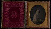 Daguerreotype portrait of a young woman seated.