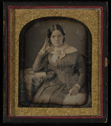 Portrait of an unidentified young woman with head on hand — circa 1845