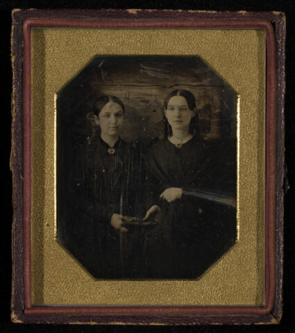 Portrait of two young women seated — circa 1850