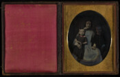 Daguerreotype group portrait of Frances Hollis Webster Hines (1832-1877) with two children. Frances was the daughter of Reverend Augustus Webster (1806-1890) of Baltimore and his wife, Mary Jane Hines (1819-1892). In 1855, she married William Marshall Hines (1821-1886). The couple were parents to: William Marshall (1852-); Augustus Webster (1860-1914); and Frances Hollis (1867-1928). The children…