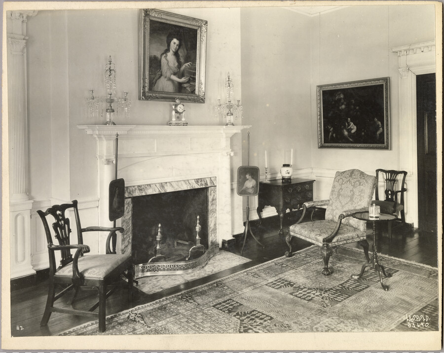 View of a fireplace and seating area in the Homewood estate. Homewood was built between 1801 and 1806 as a country home for Charles Carroll, Jr, son of Charles Carroll of Carrollton who was a signer of the Declaration of Independence. The Federal-period Palladian home was in the Carroll family until purchased by merchant William…