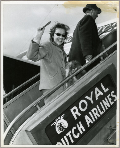 Claire McCardell boarding a plane — circa 1955