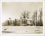 View of the grounds and exterior of the Homewood estate after a snowfall. Homewood was built between 1801 and 1806 as a country home for Charles Carroll, Jr., son of Charles Carroll of Carrollton who was a signer of the Declaration of Independence. The Federal-period Palladian home was in the Carroll family until purchased by…