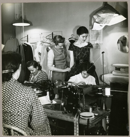 Claire McCardell fitting a dress — circa 1950