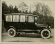 View of a hearse operated by the William J. Tickner & Sons Funeral Home located in Baltimore, Maryland. Founded by Wiliam J. Tickner (1839-1928) in 1878, the funeral home was located variously on South Eutaw and North Gilmor Streets, later moving to North and Pennsylvania Avenues.