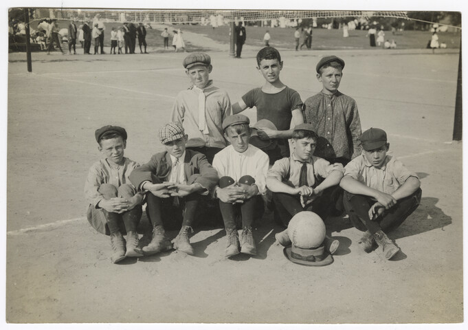 Group portrait of eight volleyball champions. — circa 1911-1936
