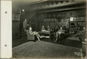 View of the reception hall attended with ten veterans at the Evergreen Jr., part of the Red Cross Institute for the Blind, Baltimore, Maryland. In operation during and after World War I for the rehabilitation of soldiers, sailors, and marines who became vision-impaired during military service, the Institute was located on Cold Spring Lane between…