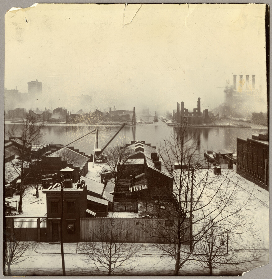View looking north from Federal Hill across the Inner Harbor at the burning downtown of Baltimore, Maryland. Hughes Street, now Key Highway, crosses in foreground; Henry Street is to the right.