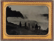 Photograph of the McKim family during a visit to Niagara Falls. The photograph was taken from the United States side of the waterfalls, at a place now known as Prospect Point. Visible in the image are Mrs. W. Duncan McKim at the extreme left, followed by Mr. and Mrs. Haslett McKim, Masters Gussie, Jamie and…
