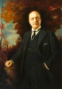 Three-quarter length portrait shows Solomon D. Warfield as standing, middle aged man gazing into left distance. He wears three-piece gray suit, black tie, white shirt, and watch chain. Red-brown trees and sky are seen in the background.