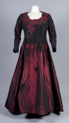 Burgundy silk satin ball or evening gown with red, brown and black lace. Custom-made by Agostino.