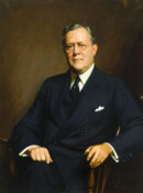 Portrait of Benjamin Howell Griswold Jr. seated, wearing a dark colored suit and tie. Griswold was a Baltimore, Maryland attorney, connected with Alex. Brown & Sons.