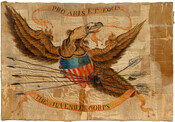 Silk, paint, and fringe flag of "The Juvenile Corps" of Easton, Maryland, 1814, painted by Sarah Hollyday Chamberlaine Kerr (Mrs. John Leeds Kerr) (1781-1820). The Juvenile Corps were a company of Maryland Militia from Easton, Maryland. John Leeds Kerr (1780-1844) was a graduate of St. Johns College in Annapolis, practiced law in Easton, and commanded…
